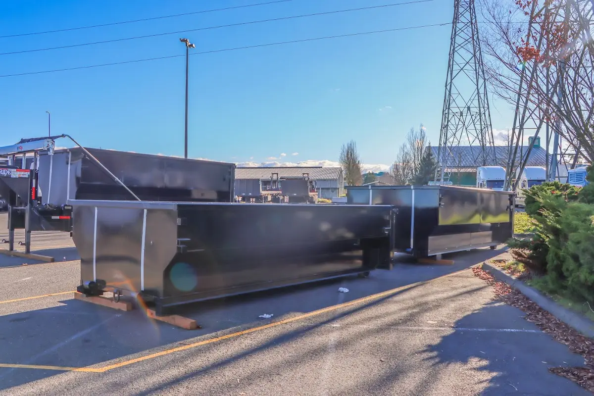 Roll-off dumpster ready for waste disposal at job site for 12 Yard Dumpster Rental in Rogers